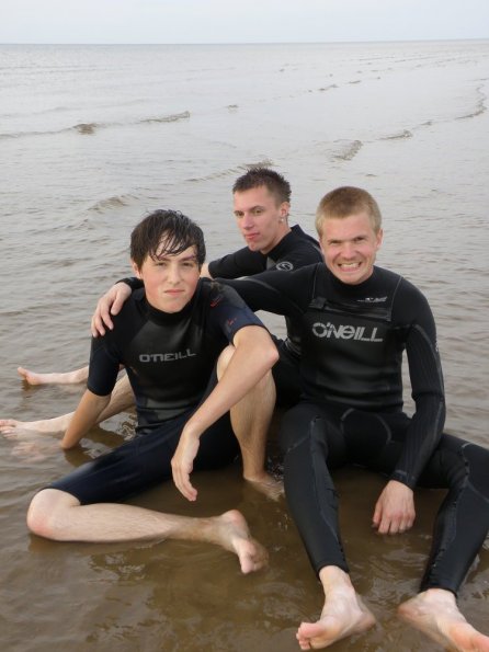 Three lads all wetsuited up!