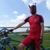 Synergy Red Cycling Skinsuit and Neoprene Pup Hood