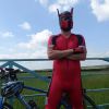 Synergy Red Cycling Skinsuit and Neoprene Pup Hood