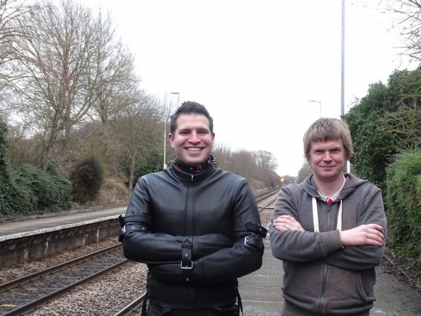 Straitjacket fun at railway station